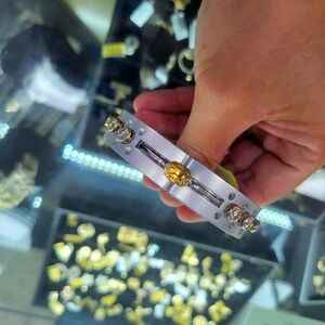 Titanium, 18k, and diamonds